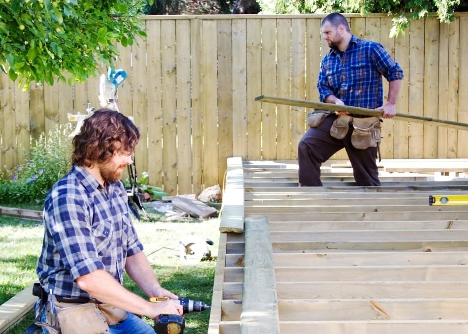 tradesmen_working_backyard.jpeg